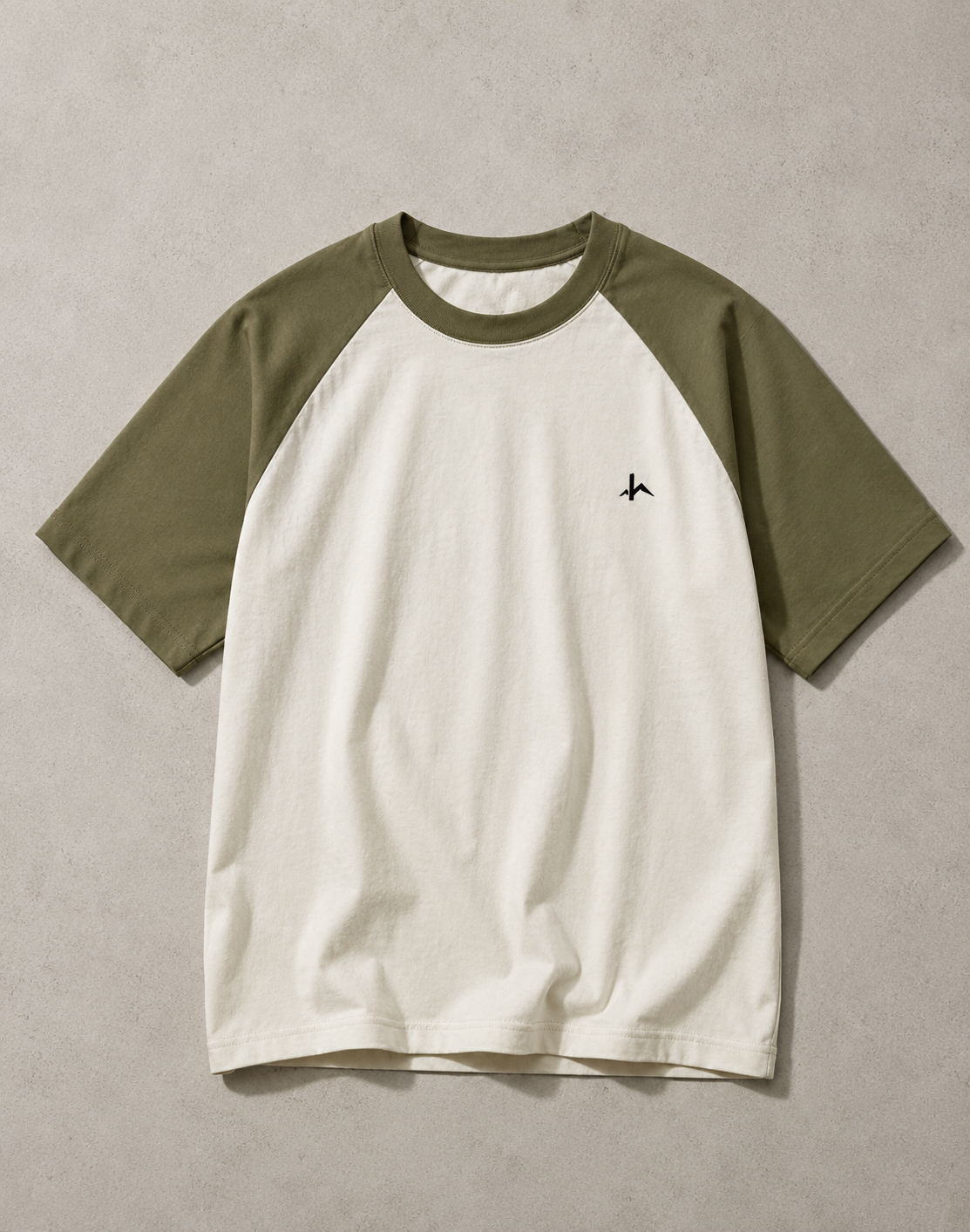 Unisex oversized raglan hoodie by HideArc featuring a relaxed fit, contrasting sleeves, and casual style.